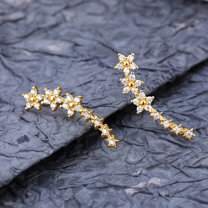 DELACROIX | BOUCLES D’OREILLES FLORALES INTEMPORELLES